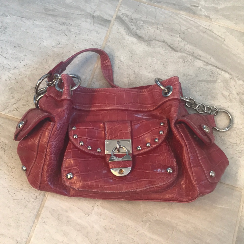 Kathy Van Zeeland pink faux snake skin purse